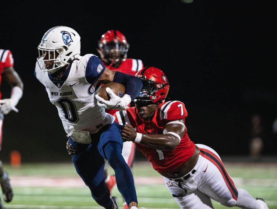 University of West Florida wide receiver John Jiles (0) breaks free from a pair of North Greenville University defenders during the Argos' win over the Crusaders on Saturday, Sept. 30, 2023, in Tigerville, South Carolina.