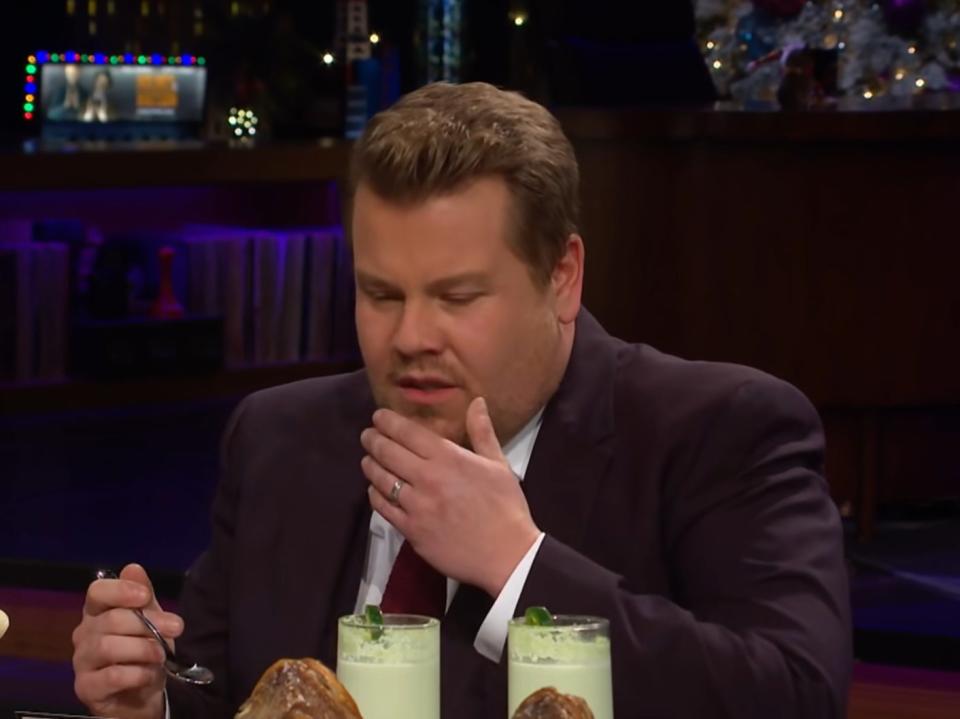 James Corden participating in a ‘Spill Your Guts or Fill Your Guts’ segment (CBS)