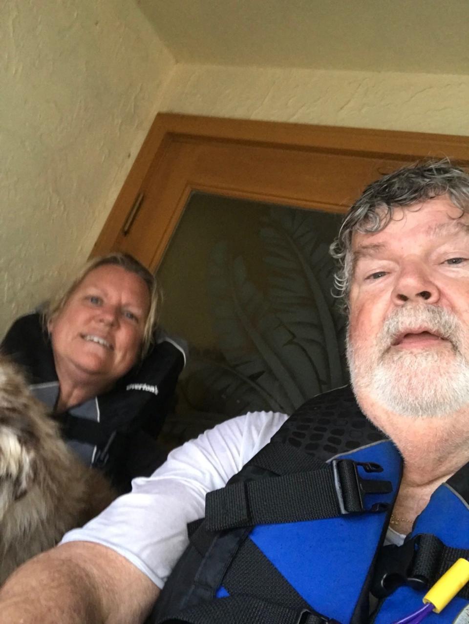 Southwest Florida residents Peggy and Bruce Zachritz tied themselves to the front porch during Hurricane Ian as water rushed into their south Fort Myers home.