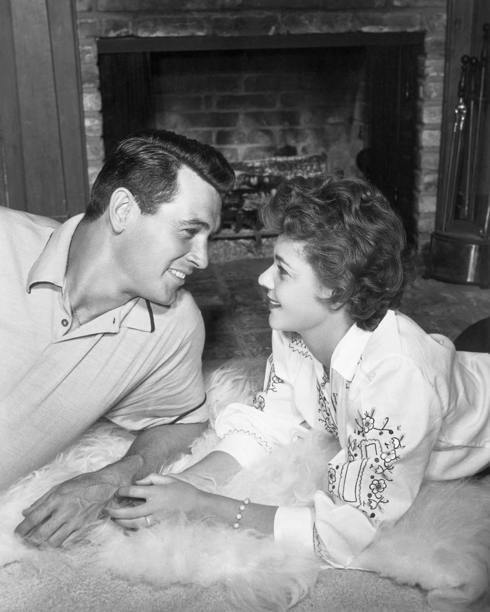 Rock Hudson and his wife Phyllis Hudson photographed in their honeymoon house in the hills above the famous Sunset Strip in Hollywood.