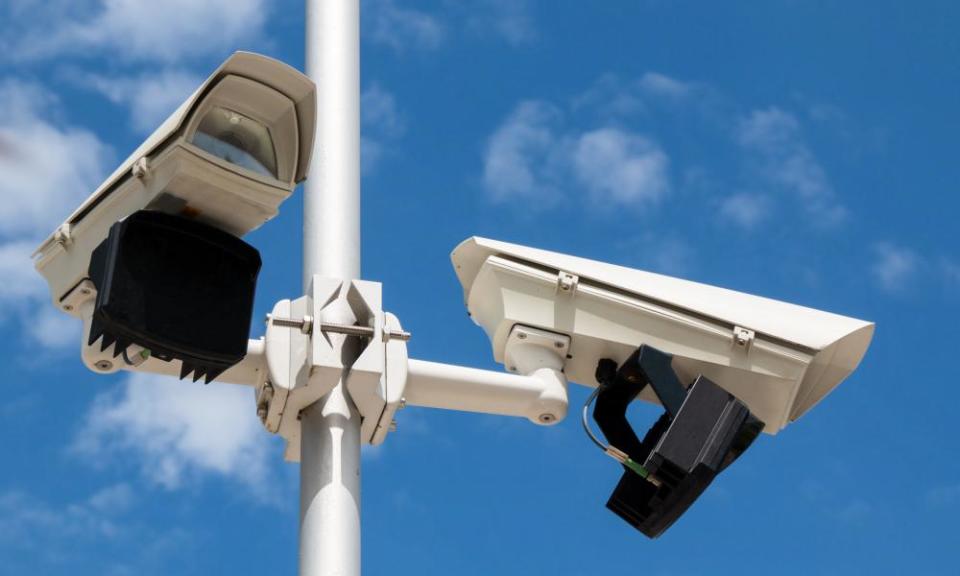 Two CCTV security cameras.