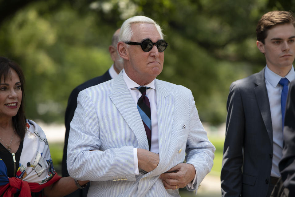 Roger Stone, a longtime confidant of President Donald Trump, accompanied by his wife, Nydia Stone, leaves federal court in Washington, Tuesday, July 16, 2019. (AP Photo/Sait Serkan Gurbuz)