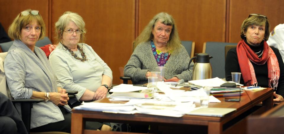 From left, defendants Diane Turco of Harwich, Susan Carpenter of South Dennis, Sarah Thacher of East Dennis, and Mary Conathan of Chatham listen to the assistant district attorney's closing argument in 2014. Cape Cod Times/Christine Hochkeppe