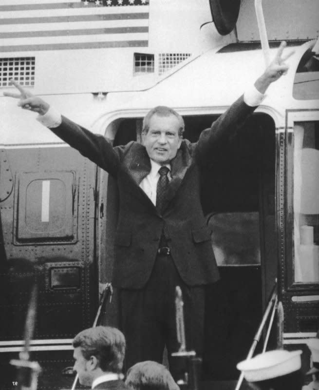 After resigning office in August 1974, President Richard M. Nixon prepares to leave the White House. On July 30, 1974, the U.S. House Judiciary Committee, by a vote of 21-17, approved a third article of impeachment against Nixon, charging him with ignoring congressional subpoenas. Photo by Ron Bennett/UPI