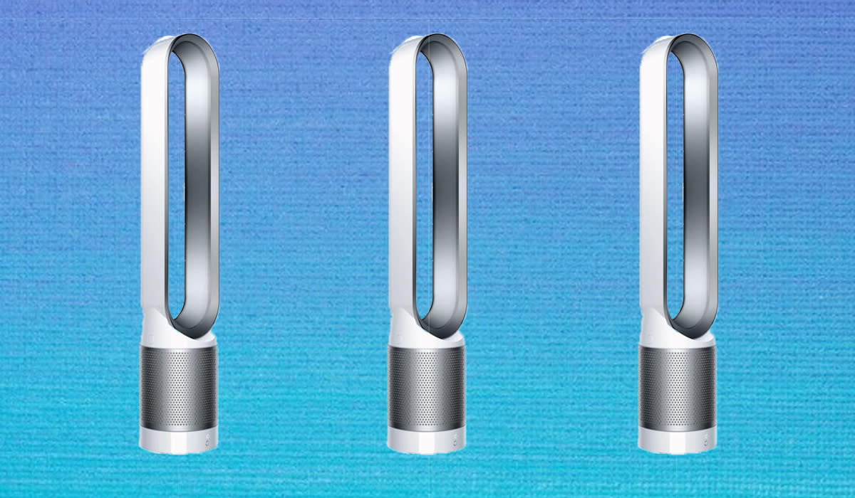 Three white Dyson Pure Cool Link tower fans shown on blue background. 