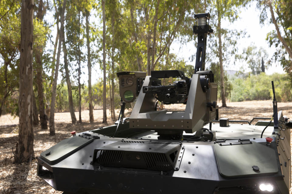 Israel Aerospace Industries' semi-autonomous four-wheel-drive "REX MKII" is seen at an IAI facility near the central Israeli city of Lod, Thursday, Sept. 9, 2021. Israel's state-owned Israel Aerospace Industries unveiled Monday a state-of-the-art unmanned vehicle their specialists said will be deployed alongside ground troops to assist in combat situations. (AP Photo/Sebastian Scheiner)