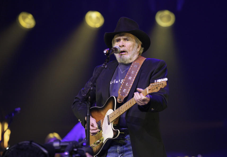 FILE - Merle Haggard performs during the All for the Hall concert on Tuesday, April 10, 2012, in Nashville, Tenn. Like Toby Keith, Haggard was politically enigmatic. Haggard’s “Okie from Muskogee” is an anti-progressive song from 1969 in which he sings, “We don’t burn our draft cards down on Main Street." And while Haggard became a hero among conservatives, he later backed prominent Democrats. (AP Photo/Mark Humphrey, File)