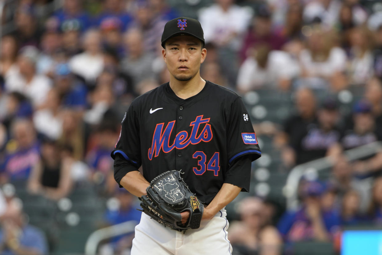 FILE - New York Mets' Kodai Senga prepares to pitch during the first inning of a baseball game against the Atlanta Braves, July 26, 2024, in New York. (AP Photo/Pamela Smith, File)