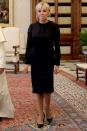 <p>In a simple black dress and pumps while visiting the Vatican. </p>