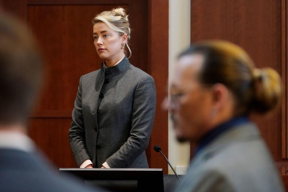 Mandatory Credit: Photo by Steve Helber/POOL/EPA-EFE/Shutterstock (12942408d) Actors Amber Heard and Johnny Depp watch as the jury comes into the courtroom after a break at the Fairfax County Circuit Court in Fairfax, Virginia, USA, 16 May 2022. Johnny Depp's 50 million US dollar defamation lawsuit against Amber Heard that started on 10 April is expected to last five or six weeks. Depp v Heard defamation lawsuit at the Fairfax County Circuit Court, USA - 16 May 2022