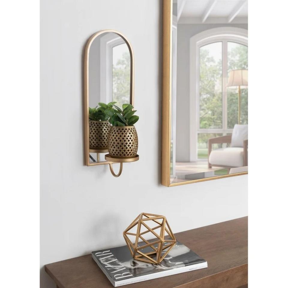 <p><a href="https://go.redirectingat.com?id=74968X1596630&url=https%3A%2F%2Fwww.overstock.com%2FHome-Garden%2FKate-and-Laurel-Ezerin-Metal-Mirror-Wall-Sconce-6x5x16%2F32281012%2Fproduct.html&sref=https%3A%2F%2Fwww.goodhousekeeping.com%2Fhome-products%2Fg43506889%2Fbest-home-products-april-2023%2F" rel="nofollow noopener" target="_blank" data-ylk="slk:Shop Now;elm:context_link;itc:0;sec:content-canvas" class="link ">Shop Now</a></p><p>Metal Mirror Wall Sconce </p><p>$62.99</p><p>Overstock.com</p>