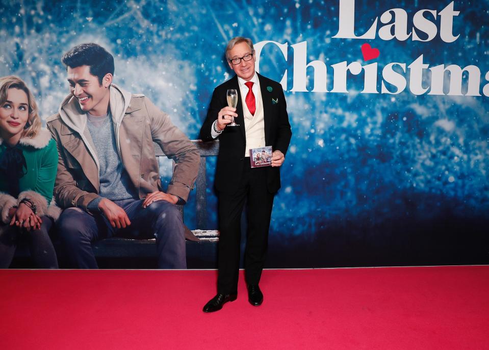 Director Paul Feig shares a toast to his film <em>Last Christmas</em> during the Sydney premiere in Australia on Wednesday.