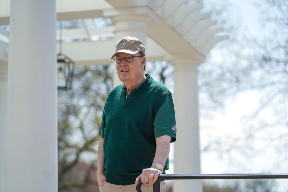 Detroit Pistons and Michigan State football announcer George Blaha stands outside of the Detroit Golf Club in Detroit on Friday, April 29, 2022.