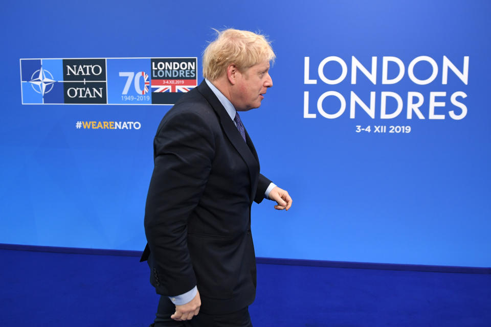 Prime Minister Boris Johnson arrives for the annual Nato heads of government summit at The Grove hotel in Watford, Hertfordshire.