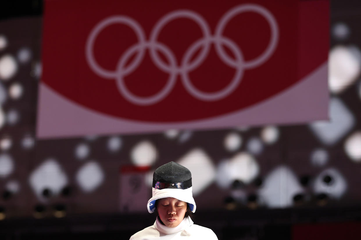 Singapore fencer Kiria Tikanah Abdul Rahman during her Tokyo Olympics women's epee individual round-of-64 match against Coco Lin of Hong Kong. 