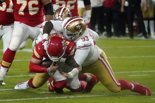 Patrick Mahomes looked out of sorts until the fourth quarter, throwing two interceptions in the face of fierce pressure from the 49ers defense including this sack by Earl Mitchell