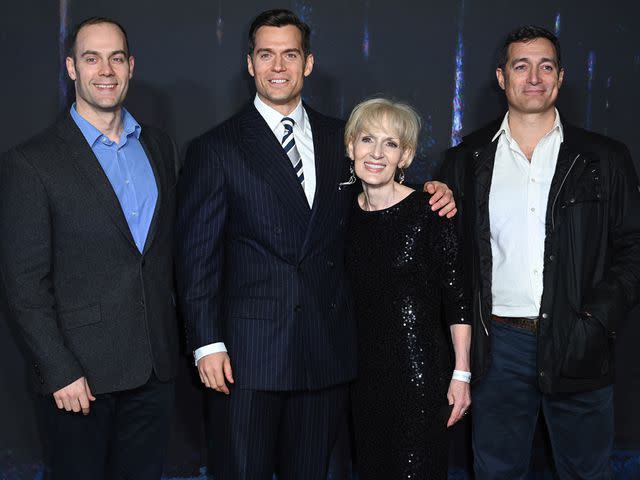 <p>Karwai Tang/WireImage</p> Henry Cavill with mother Marianne Cavill and brothers Simon and Piers attend the World Premiere of "The Witcher: season 2" on December 01, 2021 in London, England.