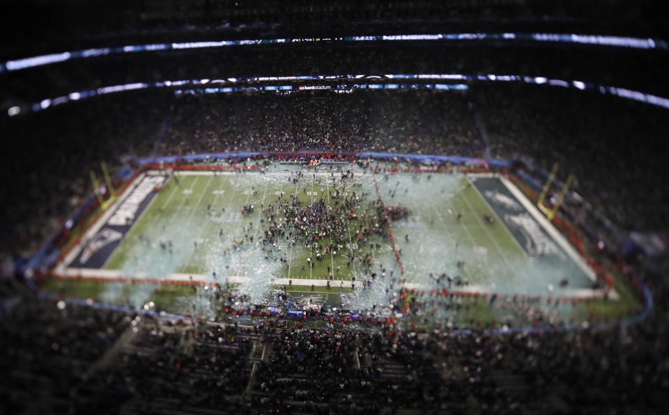 <p>In this picture made with a specialty lens the Philadelphia Eagles celebrate after the NFL Super Bowl 52 football game against the New England Patriots, Sunday, Feb. 4, 2018, in Minneapolis. The Eagles won 41-33. (AP Photo/Morry Gash) </p>