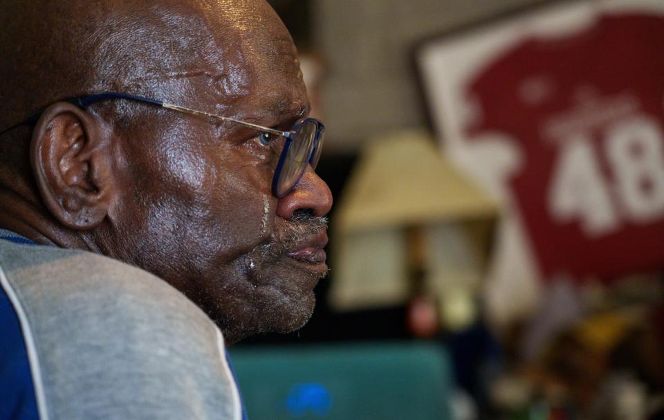 Donald Silas, a former Manuel High School football star and one of the "IU10," cries Tuesday, Feb. 6, 2024, inside his Indianapolis home as he reflects on Indiana University's 1969 football season. The IU 10 was a group of Black players who left the IU football team, boycotting against unequal treatment because of their race. "We were still in the Jim Crow days back then," he said. "It was a huge sacrifice for all of us who were involved. We never reached our full potential after that. And so that was a visual and physical representation of the importance of what we did."