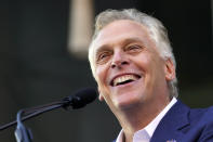 Democratic gubernatorial candidate, former Virginia Gov. Terry McAuliffe smiles during a rally in Richmond, Va., Saturday, Oct. 23, 2021. McAuliffe will face Republican Glenn Youngkin in the November election. (AP Photo/Steve Helber)