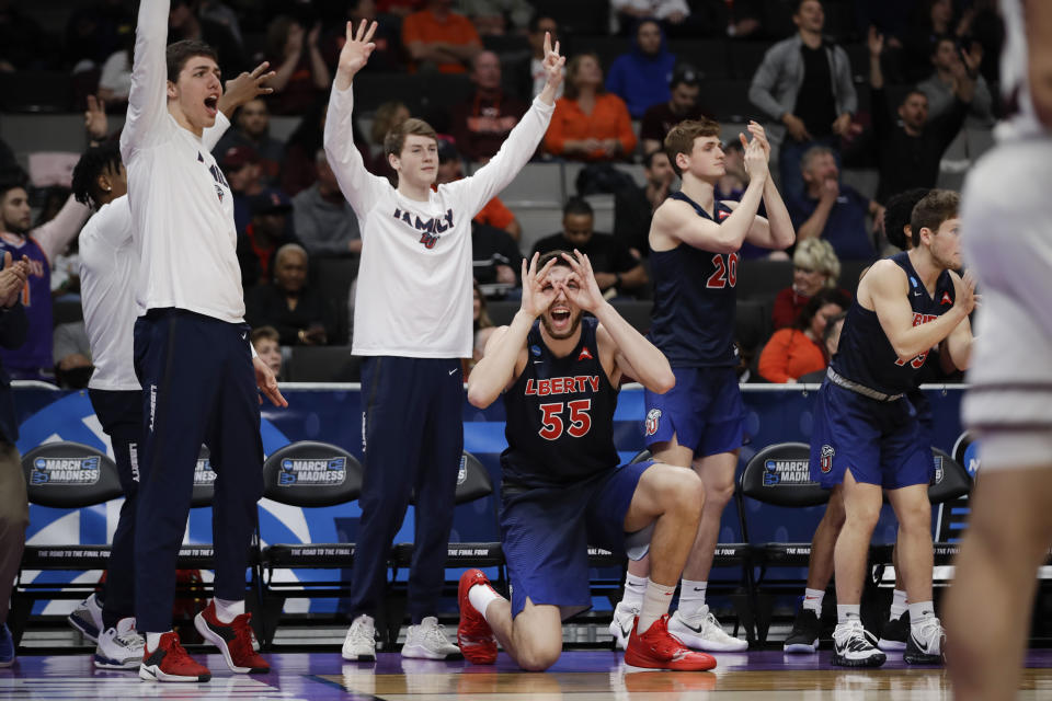 Liberty players celebrate during the second half against Mississippi State in a first-round game in the NCAA men’s college basketball tournament Friday, March 22, 2019, in San Jose, Calif. (AP Photo/Ben Margot)