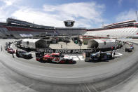 In this picture made with a fisheye lens, cars are readied for a NASCAR Xfinity Series auto race at Bristol Motor Speedway Monday, June 1, 2020, in Bristol, Tenn. (AP Photo/Mark Humphrey)