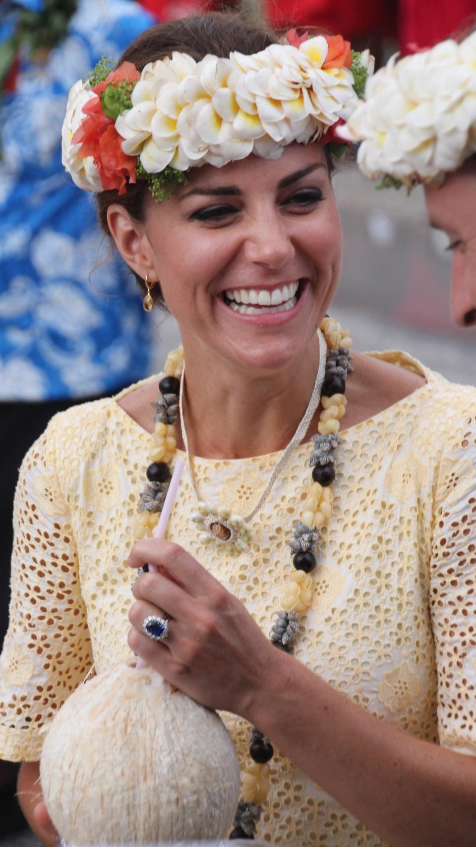 Kate Middleton drinking from a coconut