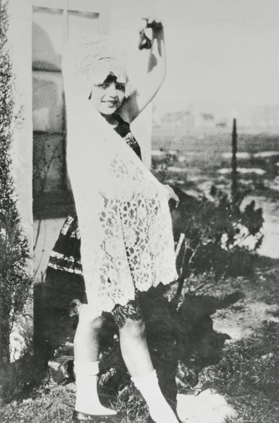 <div class="inline-image__caption"><p>Rita Hayworth, aged 10, with Spanish shawl and castanets in yard of her family home.</p></div> <div class="inline-image__credit">Bettmann</div>