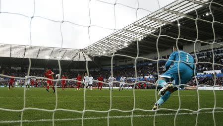 Britain Soccer Football - Swansea City v Liverpool - Premier League - Liberty Stadium - 1/10/16 Liverpool's James Milner scores their second goal from the penalty spot Action Images via Reuters / John Sibley Livepic EDITORIAL USE ONLY.