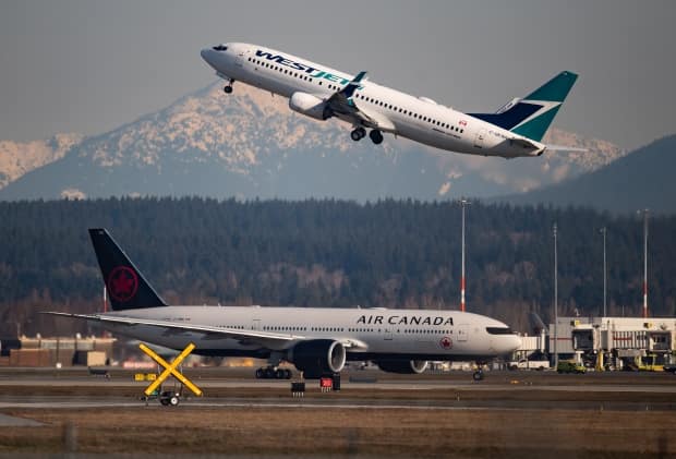 Calgary-based WestJet says it has reached a tentative agreement with the Canadian Union of Public Employees on a first collective agreement that would cover more than 3,100 cabin crew. (Darryl Dyck/The Canadian Press - image credit)