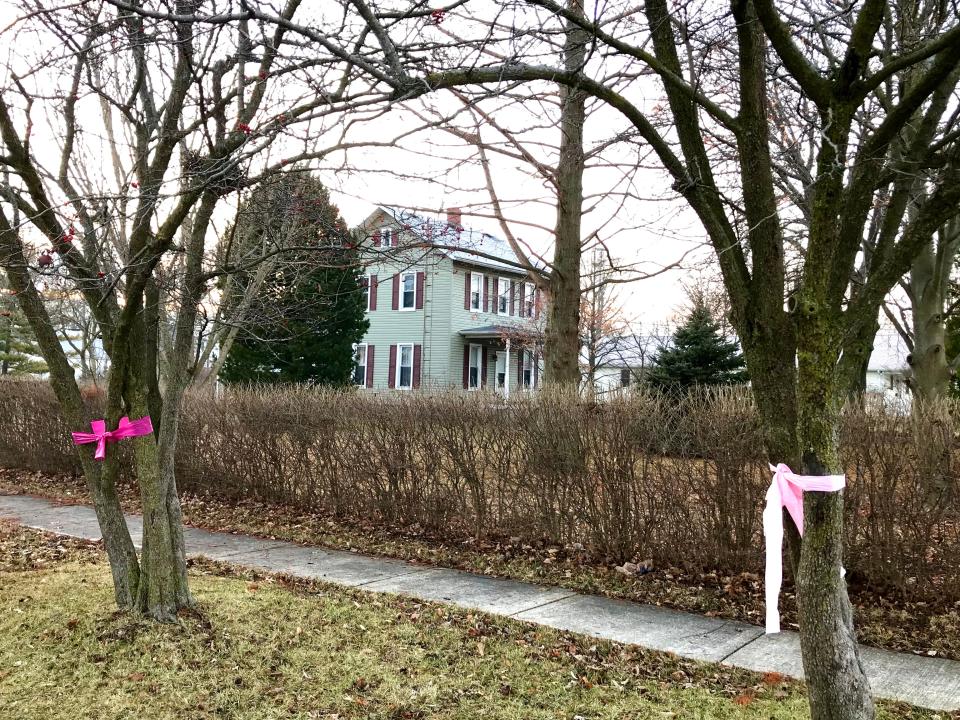 Missing teen Harley Dilly was reportedly found dead in this vacant home across the street from the Dilly's home in the 500 block of 5th Street in Port Clinton. Bright pink ribbons, reportedly the teen's favorite color, lined nearly all of 5th Street on Tuesday.