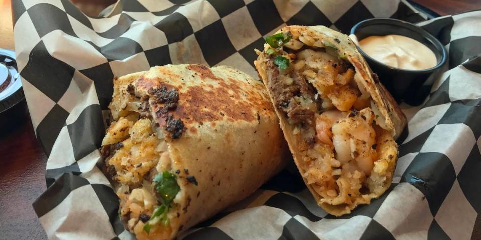 A specialty of the new Rock Tacos restaurant on Morro Bay’s Embarcadero is “The Rock Surf & Turf Burrito,” with steak, shrimp, fries, rice, beans, cheese and salsa.