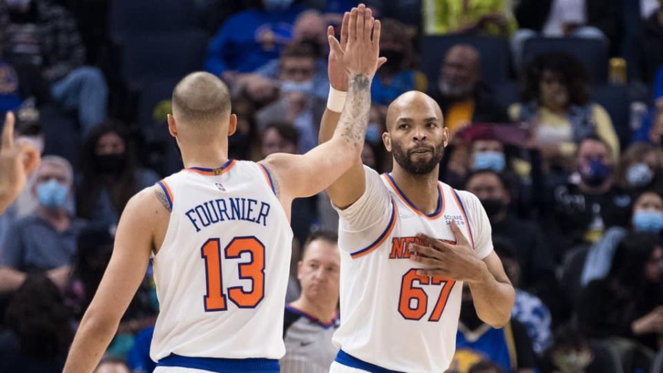 Feb 10, 2022;  San Francisco, California, USA;  New York Knicks guard Evan Fournier (13) and center Taj Gibson (67) react after drawing a foul by the Golden State Warriors during the first half at Chase Center.  Mandatory Credit: John Hefti-USA TODAY Sports