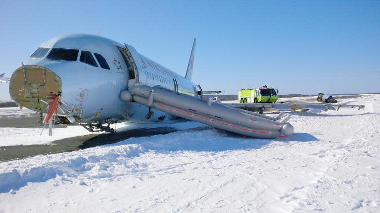 Handout photo by the Canada Transportation Safety Board shows damage to an Air Canada Airbus A-320 that skidded off the runway at Halifax International Airport in Halifax, Nova Scotia, March 29, 2015