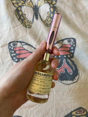 A pocket-sized, refillable travel perfume atomizer