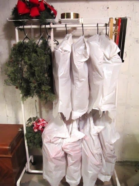 <p>If you go big when it comes to wreaths (we're talking every window, inside and out!) and don't have space in your closet for storage, invest in a <a href="https://www.amazon.com/Simple-Houseware-Heavy-Clothing-Garment/dp/B01MSAVQJO/" rel="nofollow noopener" target="_blank" data-ylk="slk:clothing rack;elm:context_link;itc:0;sec:content-canvas" class="link ">clothing rack</a> and keep 'em wrapped in plastic in your basement or garage. </p><p><em><a href="http://sewmanyways.blogspot.com/2014/01/wreath-storageusing-coat-rack.html#more" rel="nofollow noopener" target="_blank" data-ylk="slk:See more at Sew Many Ways »;elm:context_link;itc:0;sec:content-canvas" class="link ">See more at Sew Many Ways »</a></em> </p>
