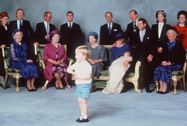 PHOTO: Surrounded by Royal relatives and godparents who are amused at the antics of young Prince William, Prince Harry is christened at Windsor Castle on December 21, 1984 in Windsor, England. (Anwar Hussein/Getty Images)