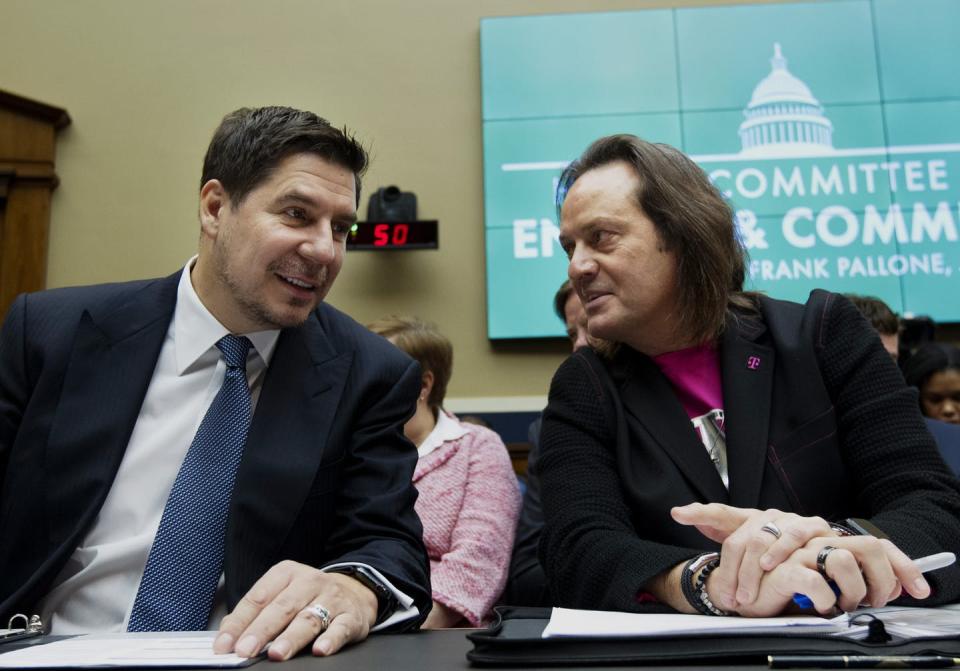 <span class="caption">Sprint Executive Chairman Marcelo Claure, left, and T-Mobile US CEO John Legere spoke at a House subcommittee hearing on their companies’ merger.</span> <span class="attribution"><span class="source">AP Photo/Jose Luis Magana</span></span>