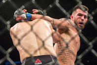 Laureano Staropoli swings a backhand strike at Muslik Salikhov at UFC Fight Night 162. (PHOTO: Dhany Osman / Yahoo News Singapore)