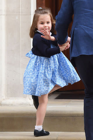 Princess Charlotte first wore the sell-out dress to meet her little brother, Prince Louis, at St Mary Hospital on 23 April [Photo: Getty]