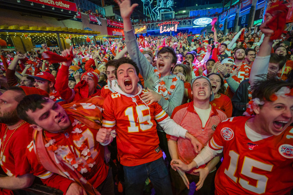 KANSAS CITY, MO - FEBRUARY 02: Chiefs fans celebrate at the Power and Light District as the Kansas City Chiefs defeat the San Francisco 49ers in the Super Bowl on February 2, 2020 in Kansas City, Kansas. (Photo by Kyle Rivas/Getty Images)