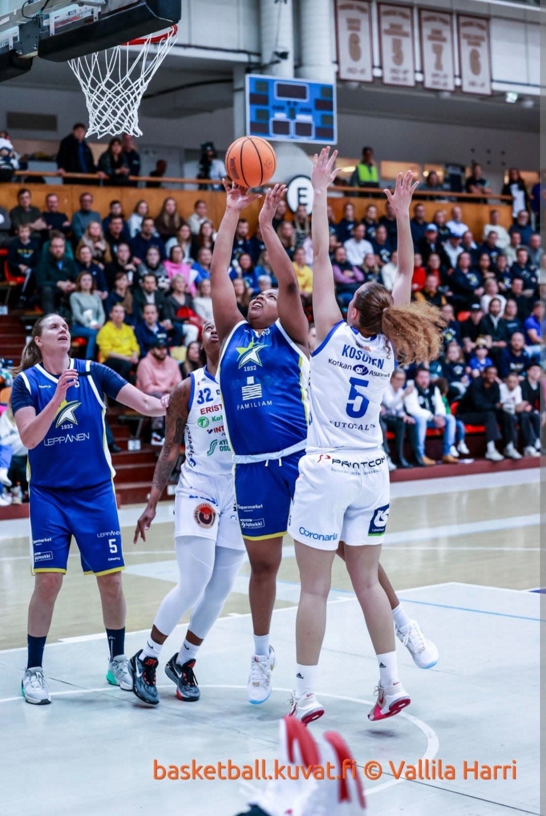 Taru Tuukkanen (far left) has played professional basketball overseas for the last 23 years since graduating from Xavier.