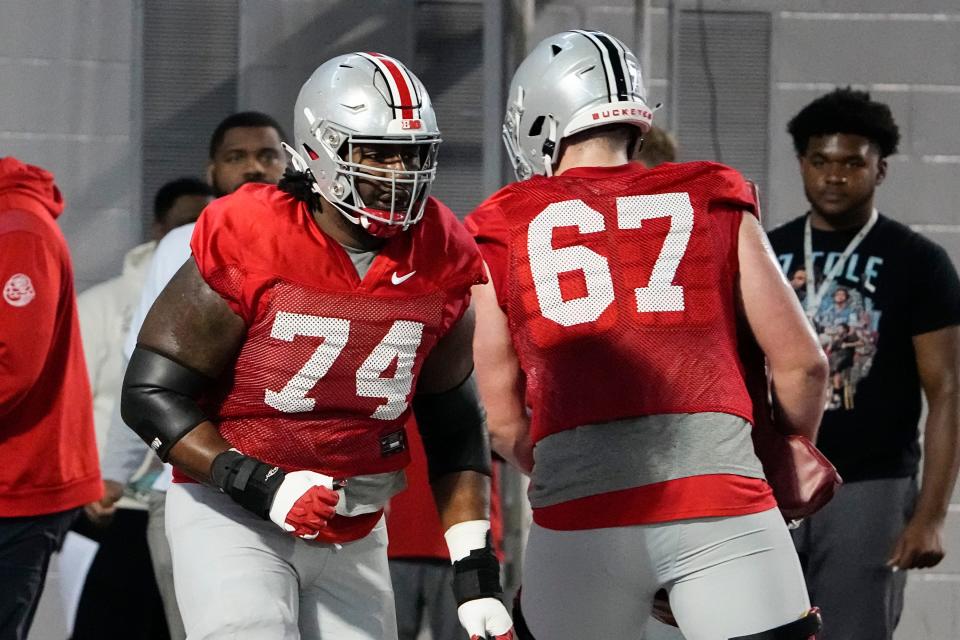 March 9, 2023; Columbus; Ohio State Buckeyes offensive lineman Donovan Jackson (74) runs during spring football practice at the Woody Hayes Athletic Center. Adam Cairns-The Columbus Dispatch