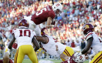 <p>Stanford running back Christian McCaffrey (5) leaps over the line of scrimmage trying to score near the end zone against Southern California during the first half of an NCAA college football game Sept. 17, 2016, in Stanford, Calif. (Photo: Marcio Jose Sanchez/AP) </p>