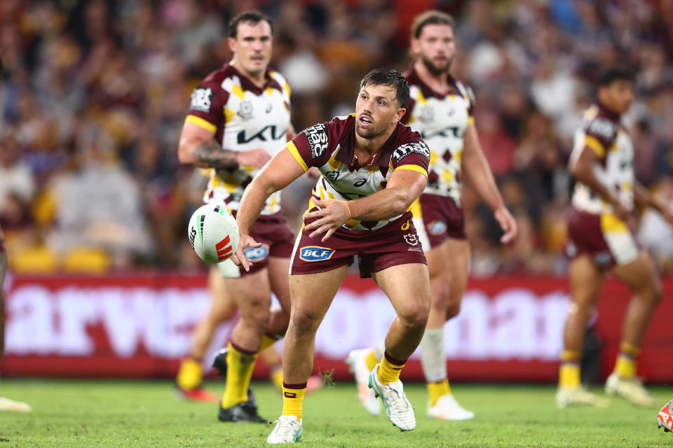 BRISBANE, AUSTRALIA - MARCH 29: Tyson Smoothy
of the Broncos passes during the round four NRL match between Brisbane Broncos and North Queensland Cowboys at Suncorp Stadium, on March 29, 2024, in Brisbane, Australia. (Photo by Chris Hyde/Getty Images)