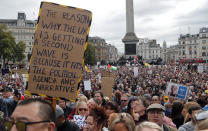 People take part in a 'We Do Not Consent' rally at Trafalgar Square, organised by Stop New Normal, to protest against coronavirus restrictions, in London, Saturday, Sept. 26, 2020. (AP Photo/Frank Augstein)