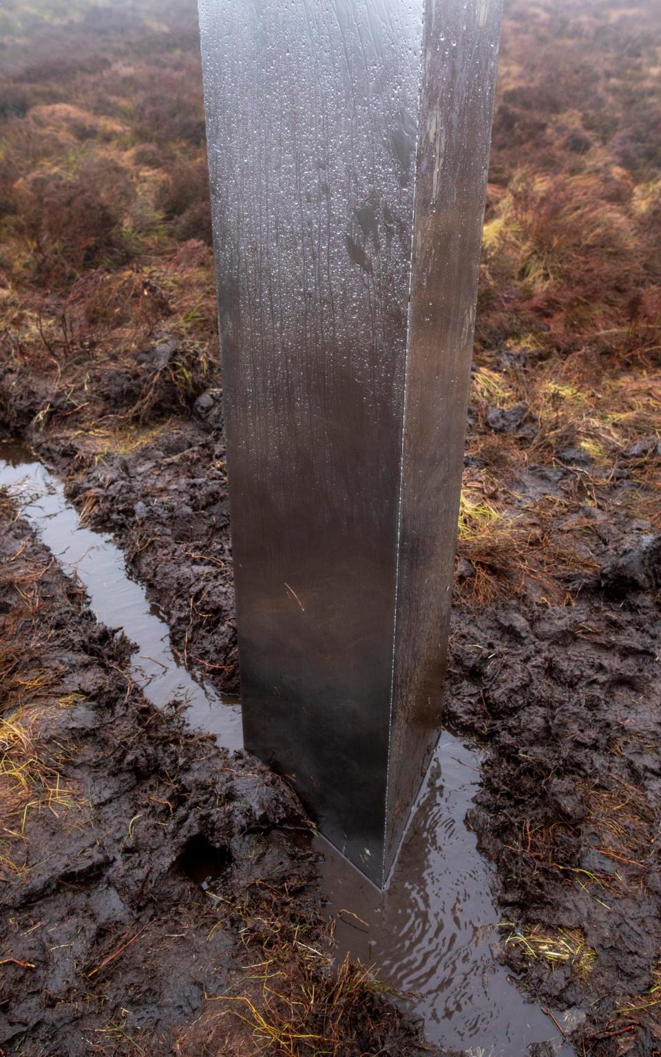 Nestled among tussocks of boggy heather, the monolith fits the scene well – but there's no real function to it