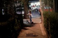 Diana Paula Melo plays with friends in her neighbourhood in Mexico City