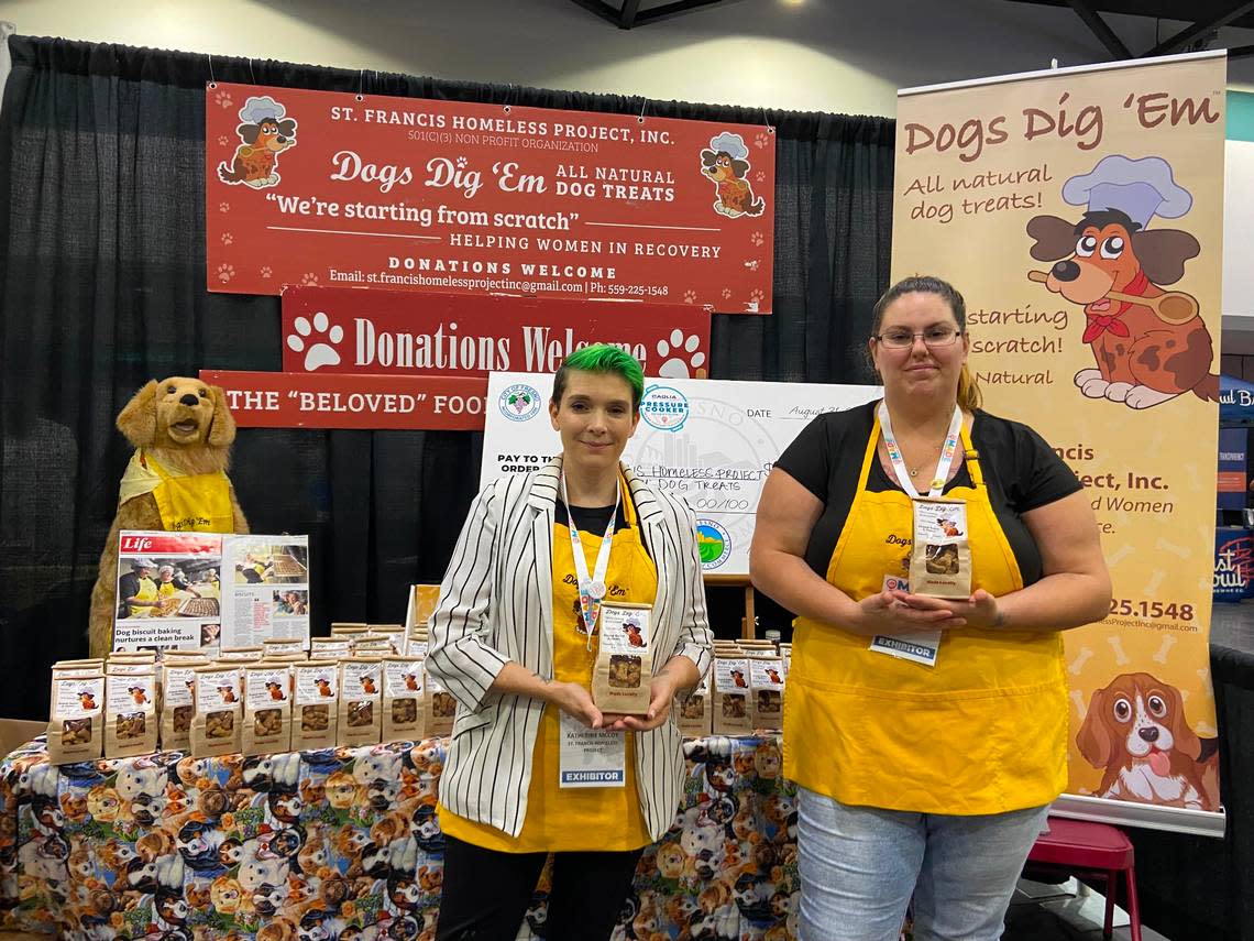 Workers at Dogs Dig ‘Em pose with the dog biscuits the nonprofit organization makes. Sales benefit the St. Francis Homeless Project, which helps train women with gaps in employment due to drug addiction, mental illness and human trafficking. Bethany Clough/bclough@fresnobee.com