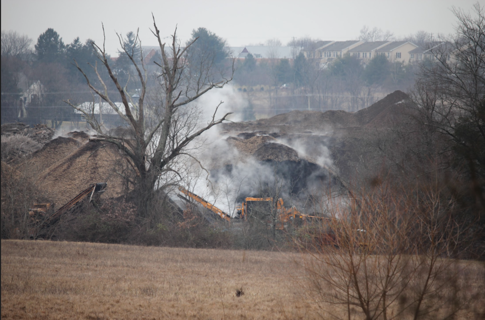 Smoke rises from mountains of steaming mulch at Froehlich's Farm & Garden Center. Residents in nearby housing developments have complained to the county, township, state Sen. Steve Santarsiero and the Pennsylvania Department of Enivronmental Protection citing concerns about the air quality and odor.